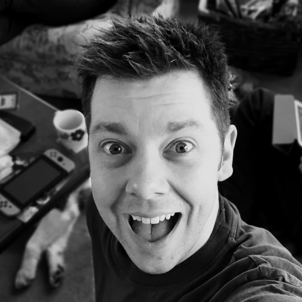 Black and white photo of James Marshall looking excitedly at the camera